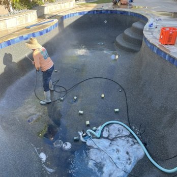 Socal Pool Remodeling - Acid wash on midnight blue pebble tech after installation - Pool & Hot Tub Service Near Me - Norco, California Socal Pool Remodeling - Acid wash on midnight blue pebble tech after installation - Pool & Hot Tub Service Near Me - Norco, California