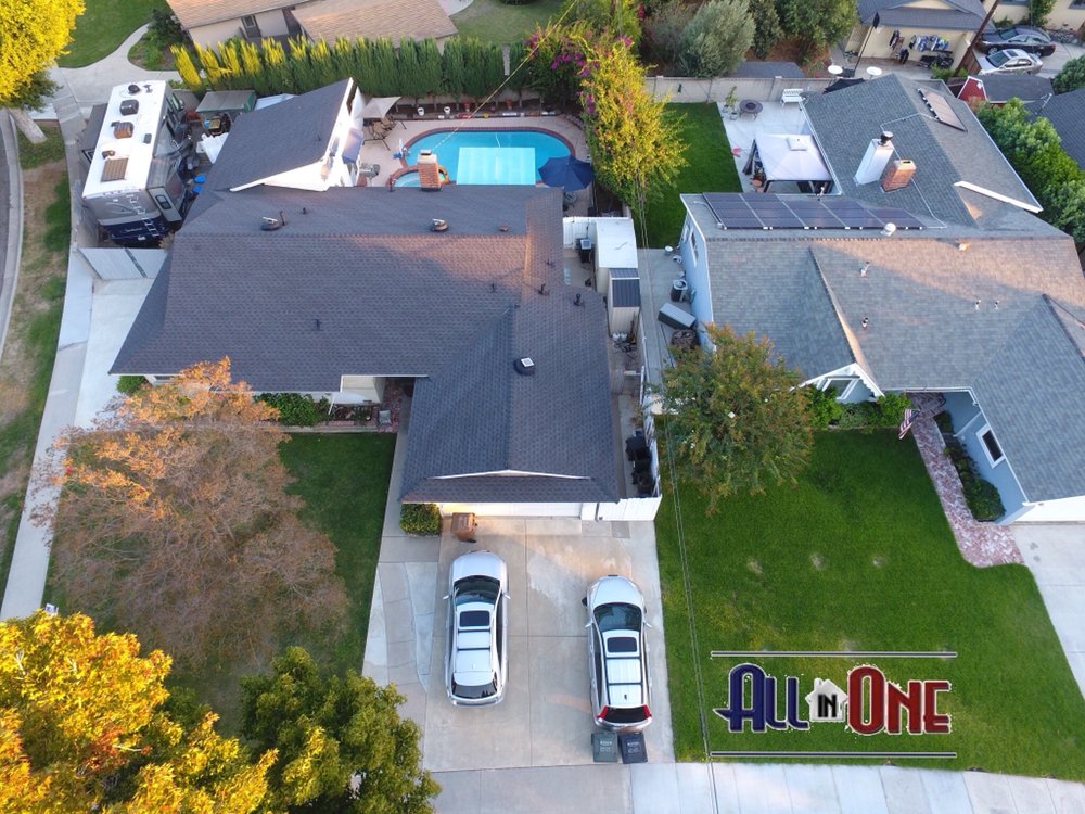 Slide of All In One Roofing and Solar