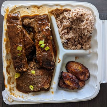 Cariblue Restaurant - BBQ Pork Ribs & Jerk Chicken above view. So much food. So delicious. - Caribbean Near Me - Modesto, California Cariblue Restaurant - BBQ Pork Ribs & Jerk Chicken above view. So much food. So delicious. - Caribbean Near Me - Modesto, California