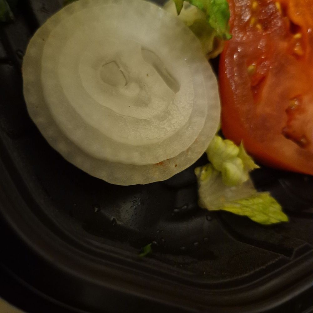 Onions that I specifically told them not to include in my order. Onions that I specifically told them not to include in my order.