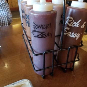 Famous Dave's Bar-B-Que - Table side sauces....rich and sassy and texas pit were our faves - Barbeque Near Me - Aurora, Colorado