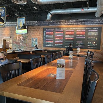 BJ's Restaurant & Brewhouse - Wall of beer options - New American Near Me - Cary, North Carolina