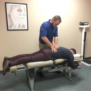 Core Health Chiropractic - Dr. Beach performing thoracic adjustment - Chiropractors Near Me - Monroe, New York