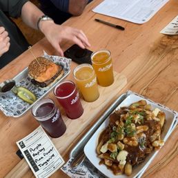 Beer flight, pulled pork poutine, beef on weck sandwich