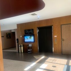 Kathy K Joo, MD - Tuesday, 2-11-2025: View of lobby where elevator is located next to the directory from the hallway.