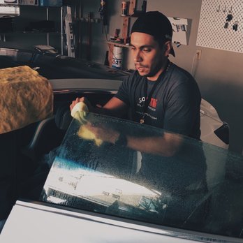 Go Tinting - Working on tint - Car Window Tinting Near Me