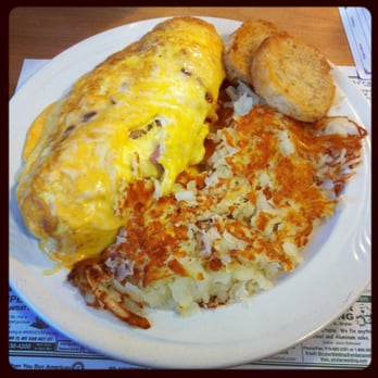 Four Seasons - Extremely delicious Ham and Cheese omelette, fresh hash browns and a biscuit. - New American Near Me - Montpelier, Ohio Four Seasons - Extremely delicious Ham and Cheese omelette, fresh hash browns and a biscuit. - New American Near Me - Montpelier, Ohio