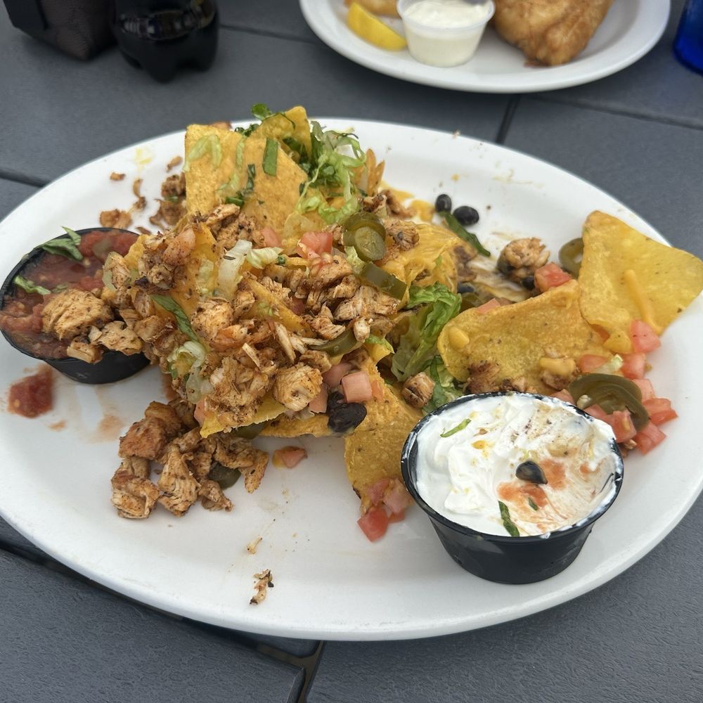 Twisted Tides - Tin Can Nachos - Beer Bar Near Me - Cocoa Beach, Florida Twisted Tides - Tin Can Nachos - Beer Bar Near Me - Cocoa Beach, Florida