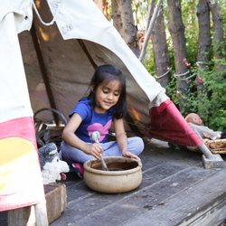 Playing in our Native American Village