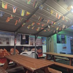 Taco Toni - The covered outdoor seating area and the taco truck