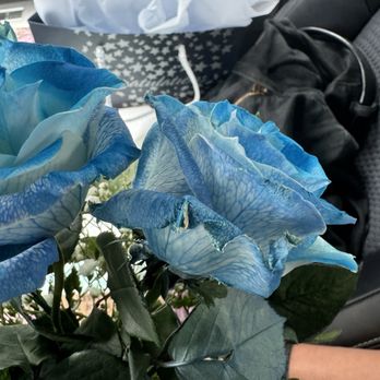 Pike Place Flowers - Shriveling petals with heavy paint splotches - Florists Near Me - Seattle, Washington