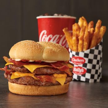 Rally's - Beef. Cheese. Bacon. Repeat.
Double up on the beef. Triple up on the cheese. And multiply the bacon FOUR TIMES... - Burgers Near Me - Poplar Bluff, Missouri
