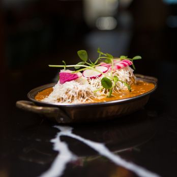 Mirch Masala - a plate of food on a table - Indian Near Me - Brampton, Ontario Mirch Masala - a plate of food on a table - Indian Near Me - Brampton, Ontario