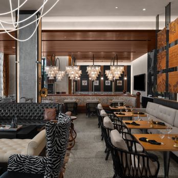 Gathre - a dining area with a long table and chairs - Breakfast & Brunch Near Me - Nashville, Tennessee