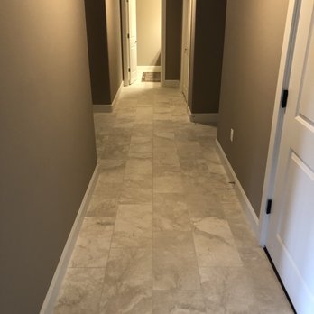Masterworks Tile Installation - Hallway with ceramic tile. - Tiling Near Me
