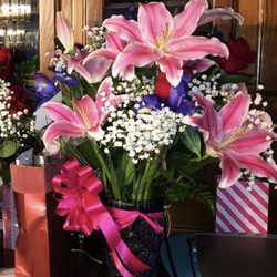 Sam's Florist - Typical drive-by bouquet * Stargazers, roses & iris