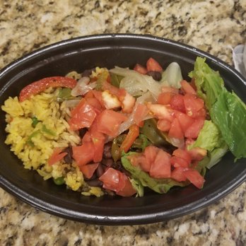 Pollo Tropical - a plate of food on a table - Fast Food Near Me - Ft. Myers, Florida Pollo Tropical - a plate of food on a table - Fast Food Near Me - Ft. Myers, Florida