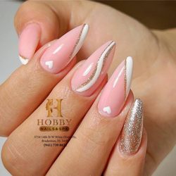 Hobby Nails And Spa - Get that soft glam with blush pink, white art, and a hint of glitter--where subtle meets stunning