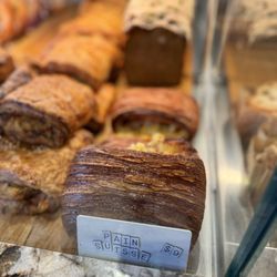 Ad Astra Bread Co - Reuben croissant peekaboo tucked behind the pain suisse -- YUM