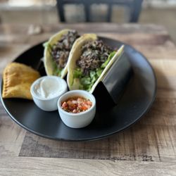 Kingston Grill - Oxtail tacos and half a beef patty