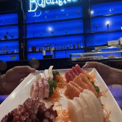 Bojangles Sushi & Oyster Bar - Sashimi delight with octopus, snapper, yellowtail, salmon, white tuna (yummiest) & tuna.