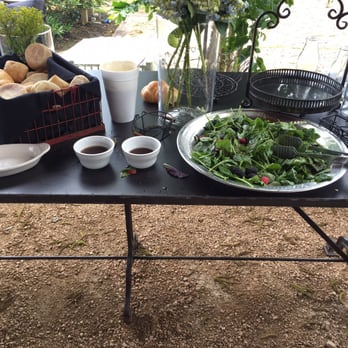 Haras Restaurant - Sad salad. Note the dressing in the giant styrofoam cup - Latin American Near Me - Magnolia, Texas