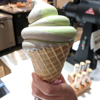 Momo Cafe - Matcha and black sesame soft serve ($5.50) in a waffle cone (+$1). - Desserts Near Me - Atlanta, Georgia Momo Cafe - Matcha and black sesame soft serve ($5.50) in a waffle cone (+$1). - Desserts Near Me - Atlanta, Georgia
