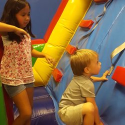DP Bounce Indoor Party Center - He doesn't need any help climbing to the slide!