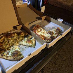Firewood - Chicken Pesto and Cheese Pizza.  Tail gate dinner!