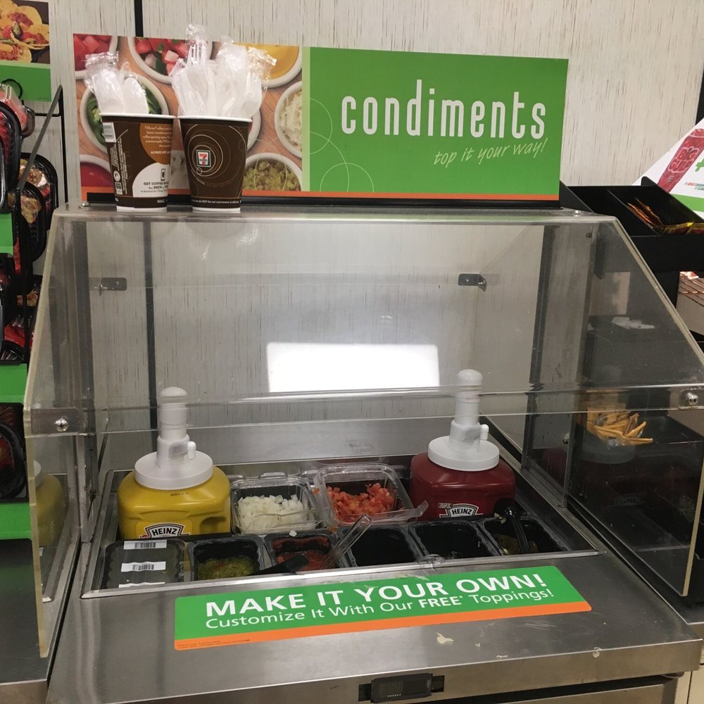 7-Eleven - a counter with condiments and condiments - Convenience Stores Near Me - Great Neck, New York 7-Eleven - a counter with condiments and condiments - Convenience Stores Near Me - Great Neck, New York