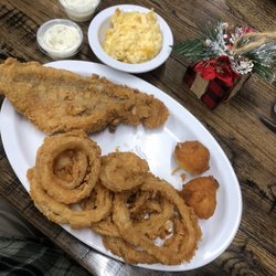 The Station House Restaurant - Catfish platter with hush puppies, onion rings and Mac and cheese.