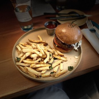 Panxa Cocina - Green chile cheeseburger with French fries. - Cocktail Bars Near Me - Long Beach, California