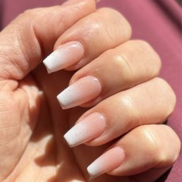 Gel X, ombré with sparkle in the sunlight.