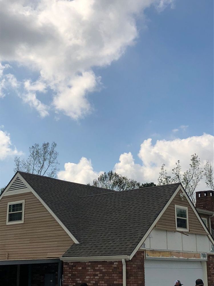 Slide of Pelican Roofing Company