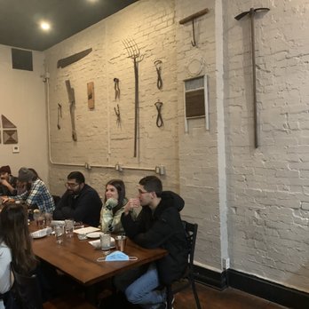 Alqueria Farmhouse Kitchen - First little room with seating - New American Near Me - Columbus, Ohio Alqueria Farmhouse Kitchen - First little room with seating - New American Near Me - Columbus, Ohio