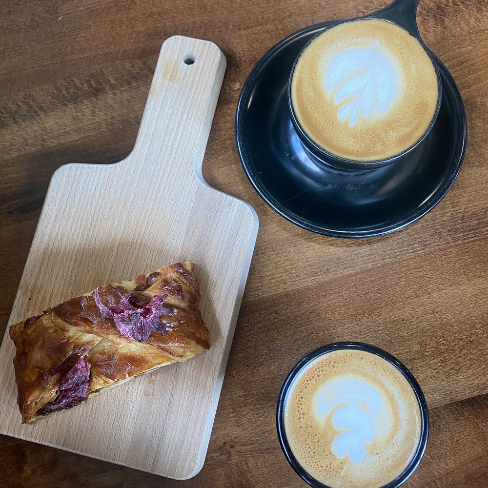 Ovenbird - Fig Jam + Brie Danish, Oat Milk Cortado and Cappuccino - Modern European Near Me - Austin, Texas Ovenbird - Fig Jam + Brie Danish, Oat Milk Cortado and Cappuccino - Modern European Near Me - Austin, Texas