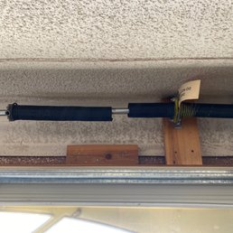 Broken torsion spring.