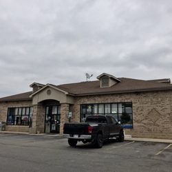 Wixom Sun Sunoco Gas Station - Convenience store, view facing northeast