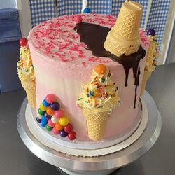 PattyCakes 716 - Vanilla cake, whipped Amer. buttercream & sour strawberry between layers, Swiss meringue & French on the outside. G-f, d-f options