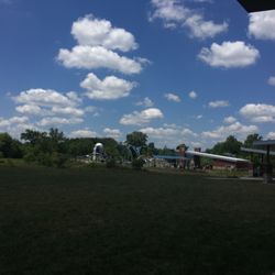 Carmel Clay Parks & Recreation - Splash pad children's play area across the open field