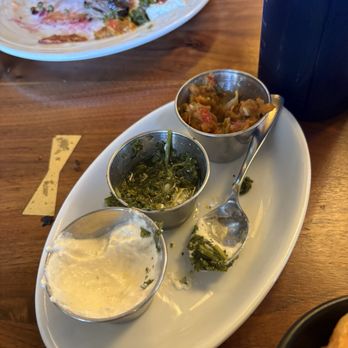 Fogo de Chão - Horseradish and chimmichurri and a spicy sauce - Brazilian Near Me - Pasadena, California Fogo de Chão - Horseradish and chimmichurri and a spicy sauce - Brazilian Near Me - Pasadena, California