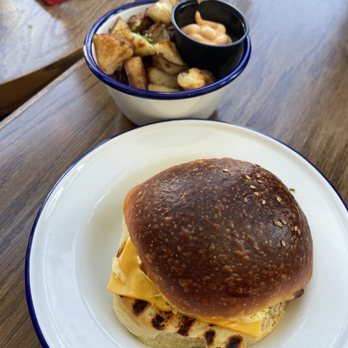 Little Canal - Egg Egg & Cheese Sandwich and Side of Potatoes - Bars Near Me - New York, New York Little Canal - Egg Egg & Cheese Sandwich and Side of Potatoes - Bars Near Me - New York, New York