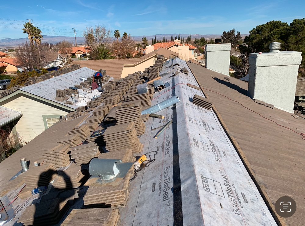 Slide of TopStamp Roofing