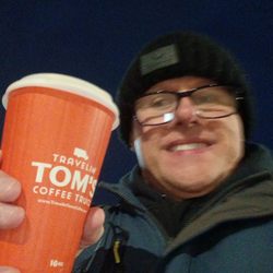 Travelin' Tom's Coffee - A person got a hot cappuccino with salted caramel.