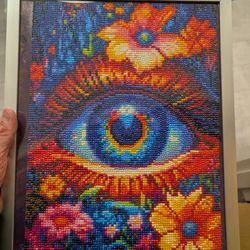 Quan Anh Nguyen - Dr. Quan displays art from local artist Marsha Hull. This piece is made of 11,500 beads and took over 15 hours to make.