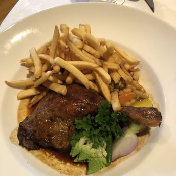 Le Crocodile Restaurant - Classic Confit de Canard with pommes frites - French Near Me - Vancouver, British Columbia Le Crocodile Restaurant - Classic Confit de Canard with pommes frites - French Near Me - Vancouver, British Columbia
