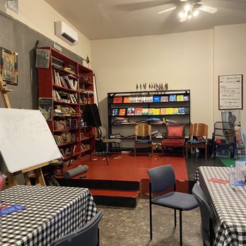 Jikoni Cafe - a dining area with tables and chairs - Vegan Near Me - Norfolk, Virginia Jikoni Cafe - a dining area with tables and chairs - Vegan Near Me - Norfolk, Virginia