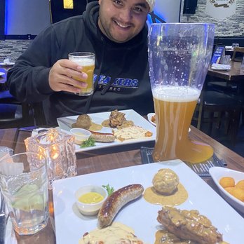 OB's Brau Haus - The boot beer schnitzel pork shank meatball and bratwurst - Dance Clubs Near Me - Appleton, Wisconsin
