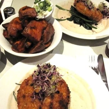 Mildreds - sunblushed tomato and buffalo mozzarella risotto cake & sweet potato wedges. - Vegan Near Me - London, XGL Mildreds - sunblushed tomato and buffalo mozzarella risotto cake & sweet potato wedges. - Vegan Near Me - London, XGL