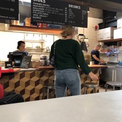 Falafel & Burgers - Inside the food market, she gave no customer service, th guy who made the burger was nice!